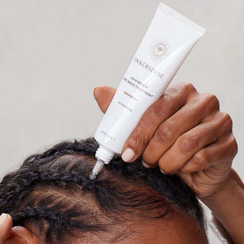 Innersense Organic Beauty Hair Renew Pre Wash Treatment - model holding product near scalp