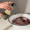 Eucalan Eucalyptus Delicate Wash - Model shown dispensing product