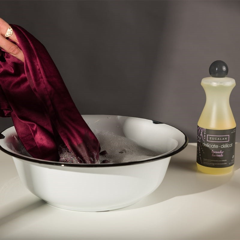 Eucalan Lavender Delicate Wash - Model showing washing clothing with product