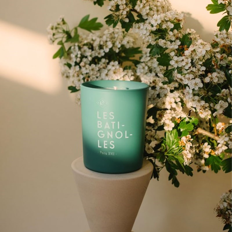 Kerzon Fragranced Candle – Les Batignolles  lifestyle photo in front of flowers