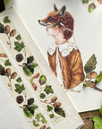 Georgiou Draws Natural Seeds and Elements Woodland Washi Tape - Product shown on scrapbook