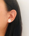 YSIE Angelique Mother-Of-Pearl Gold Plated Earrings- Closeup of model with earring in ear