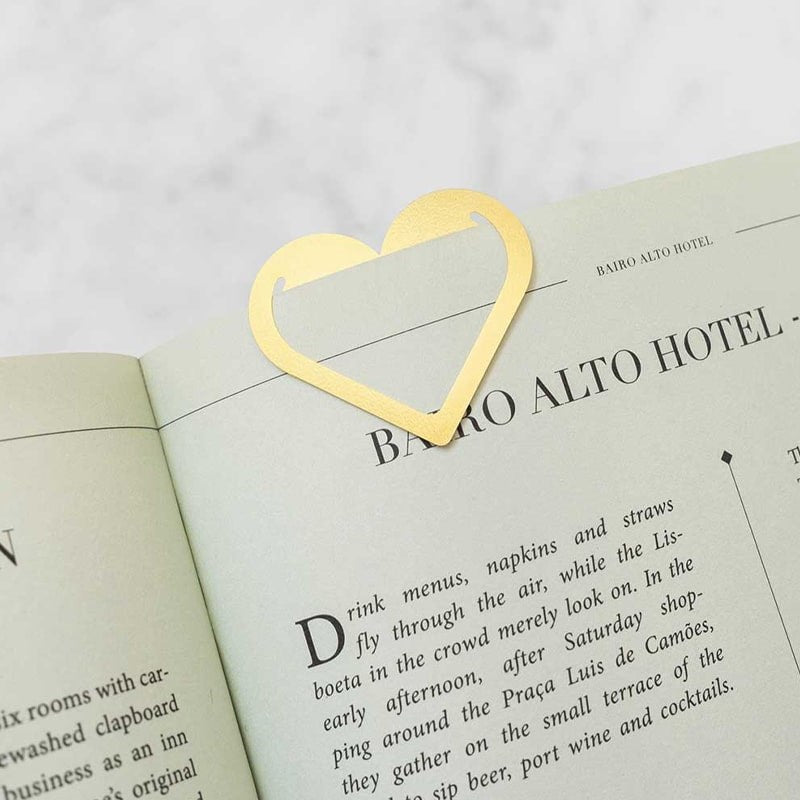 Octaevo Multi-Use Metal Clips – Merci- Product shown in book