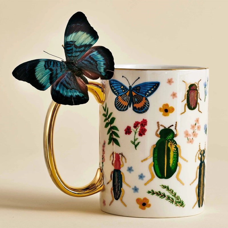 Rifle Paper Co. Curio Porcelain Mug - Beauty shot, product shown with butterfly