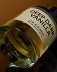 D.S. & Durga Deep Dark Vanilla Eau de Parfum - Side shot of product laying flat