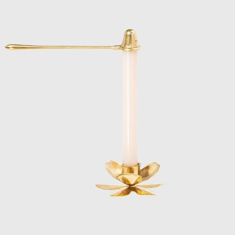 Trudon Taper Candle Snuffer - Product shown snuffing out candle