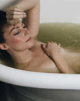 Pursoma Tubmarine Detox Bath Treatment - Model shown in bath tub