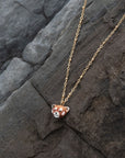 Nach Red Panda Mini Necklace - Product shown on rock background