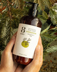 8 Days Botanicals Evergreen Botanical Bodywash - Product shown in models hands