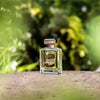 Ormonde Jayne Isfarkand Eau de Parfum (88 ml) - Beauty shot, product shown with foliage in the background