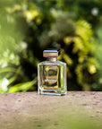 Ormonde Jayne Isfarkand Eau de Parfum (88 ml) - Beauty shot, product shown with foliage in the background