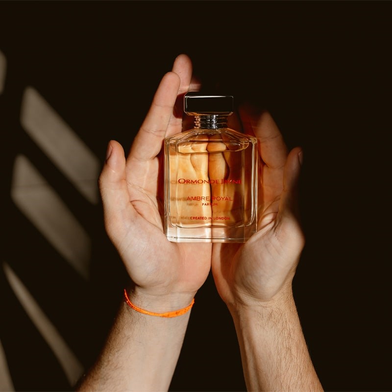 Ormonde Jayne Ambre Royal Eau de Parfum - bottle in the hands of model