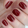 Tenoverten Nail Polish - Carmine - model hand showing nail polish on nails