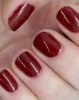 Tenoverten Nail Polish - Carmine - model hand showing nail polish on nails