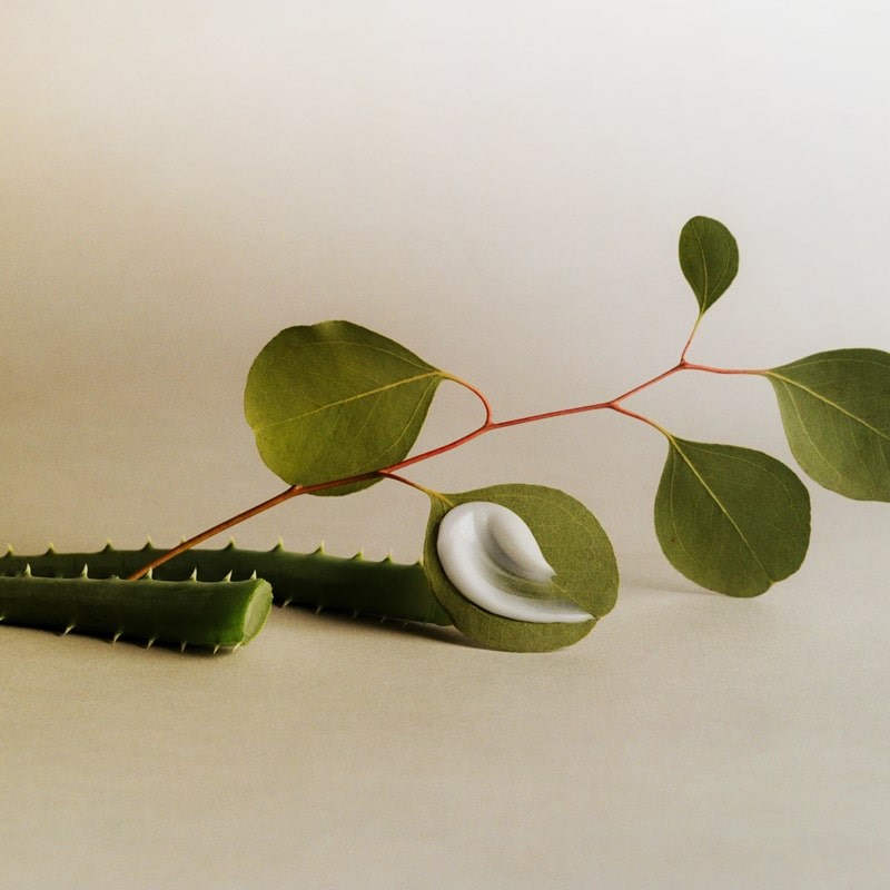 3rd Ritual Sun Botanical Body Gel - Beauty shot, product smear shown on leaf