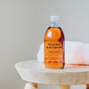 Susanne Kaufmann Hayflower Bath Oil - Product shown on stool
