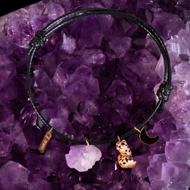 Nach Leopard, Moon & Amethyst Charm Bracelet - bracelet sitting on amethyst