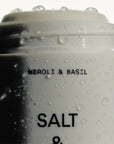 Salt & Stone Neroli & Basil Deodorant - cap off and water drops on product