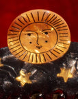 Winona Irene Sun and Stars Claw showing close-up of Sun face for detail