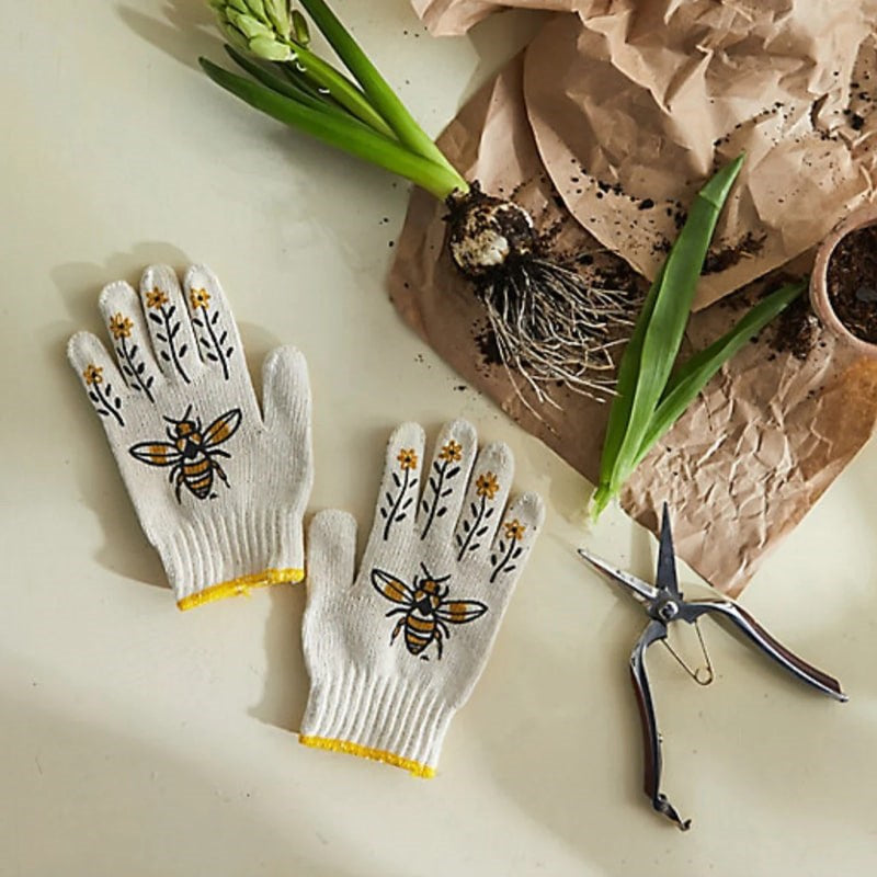 My Little Belleville Bee Gardening Gloves - Product shown with plants and gardening tools