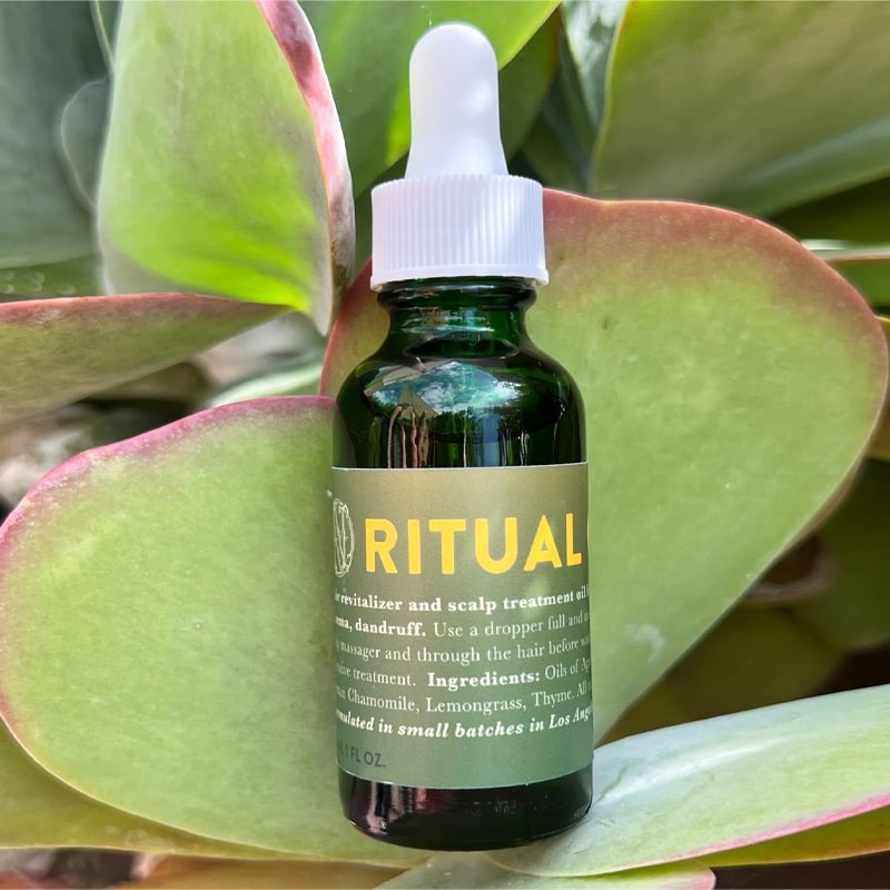 Neil Naturopathic Ritual Oil Remedial Treatment - Product shown on top of leaf