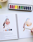 Emily Lex Studio Birds Watercolor Workbook - Model shown painting