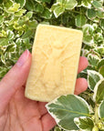 The Edinburgh Natural Skincare Company Luxury No. 1 Solid Hand Cream Bar - Product shown in models hand