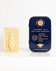 The Edinburgh Natural Skincare Company Luxury No. 1 Solid Hand Cream Bar - Product shown next to packaging