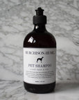Murchison-Hume Organic Pet Shampoo - Clary Sage & Fur - Product shown on marble counter