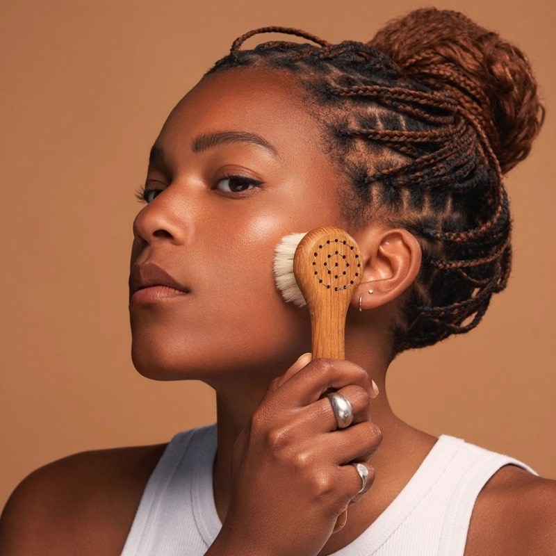 Province Apothecary Daily Glow Facial Dry Brush - Model shown using product on face