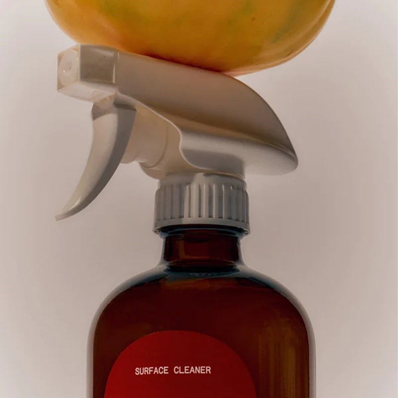 Flamingo Estate Organics Roma Heirloom Surface Cleaner - Closeup of product with tomato on top