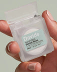 Davids Expanding Dental Floss - Refillable Dispenser - Mint - Product shown in models hand