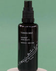 Kahina Giving Beauty Toning Mist- Product shown on green background