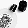 Diptyque Fleur de Peau Hair Mist - Product shown next to cap