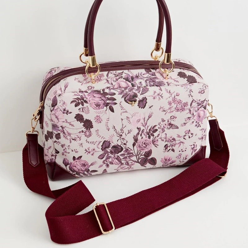 Fable England Large Bowling Bag - Plum Rambling Floral- Product shown with strap attached