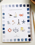 Emily Lex Studio Seaside Watercolor Workbook - Product shown with paint brush