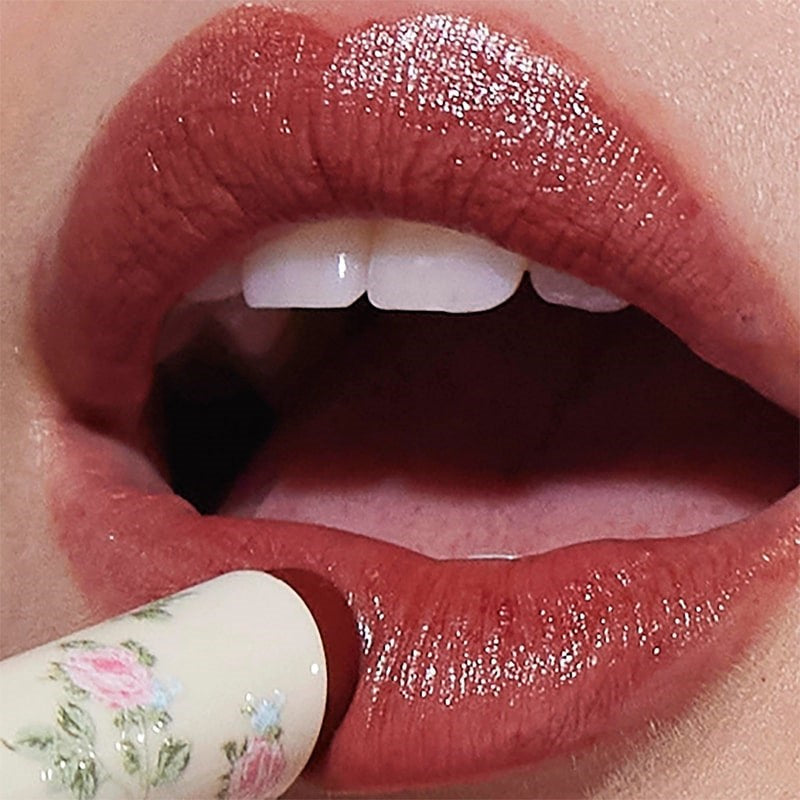 Yolaine Tinted Lip Balm - Brioche- Closeup of model applying product