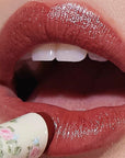 Yolaine Tinted Lip Balm - Brioche- Closeup of model applying product