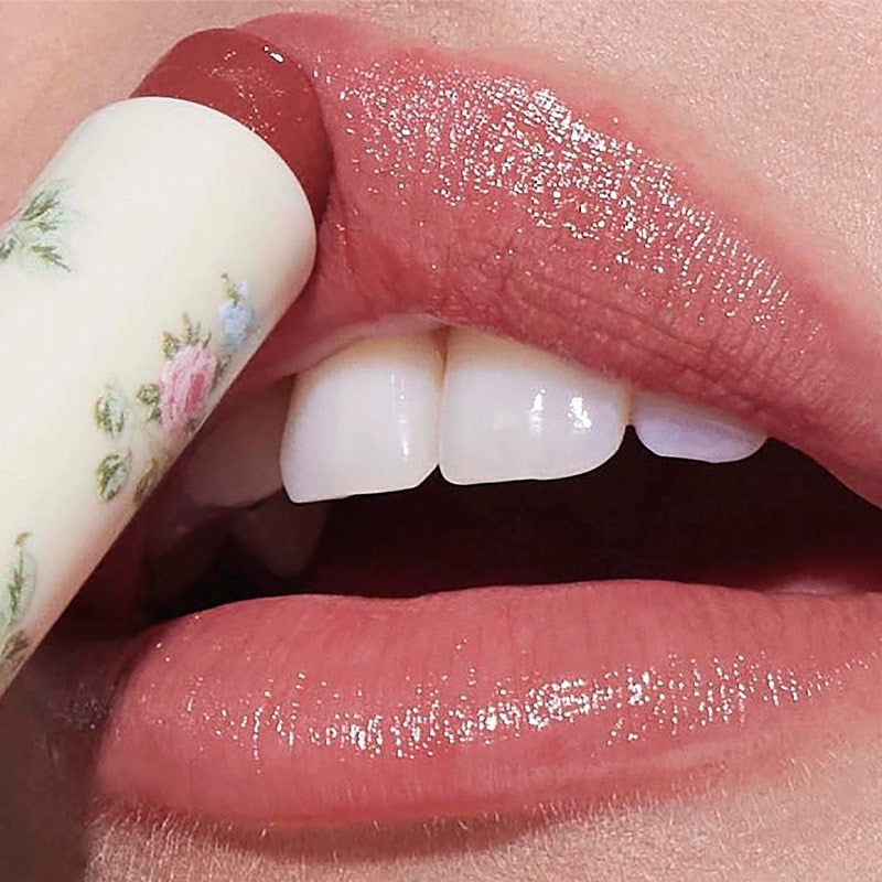 Yolaine Tinted Lip Balm - Chouquette - Closeup of model applying product