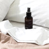 One Seed Laundrette Sleepy Sheets Pillow Mist - Product shown next to pillow