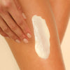 Rahua Enchanted Island Body Glow Cream - Product smear shown on models skin