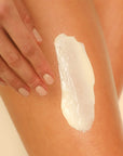Rahua Enchanted Island Body Glow Cream - Product smear shown on models skin