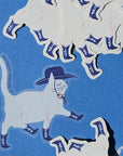 Bromstad Printing Co. Cowboy Cat Clear Sticker - Stickers  laid out on blue table
