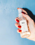 R+Co Rockaway Salt Spray - Closeup of model dispensing product