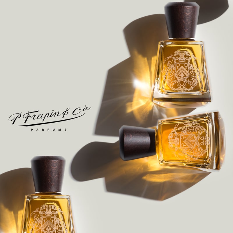 Up Close & Personal with Frapin Parfums showing 3 Frapin perfume bottles with company logo